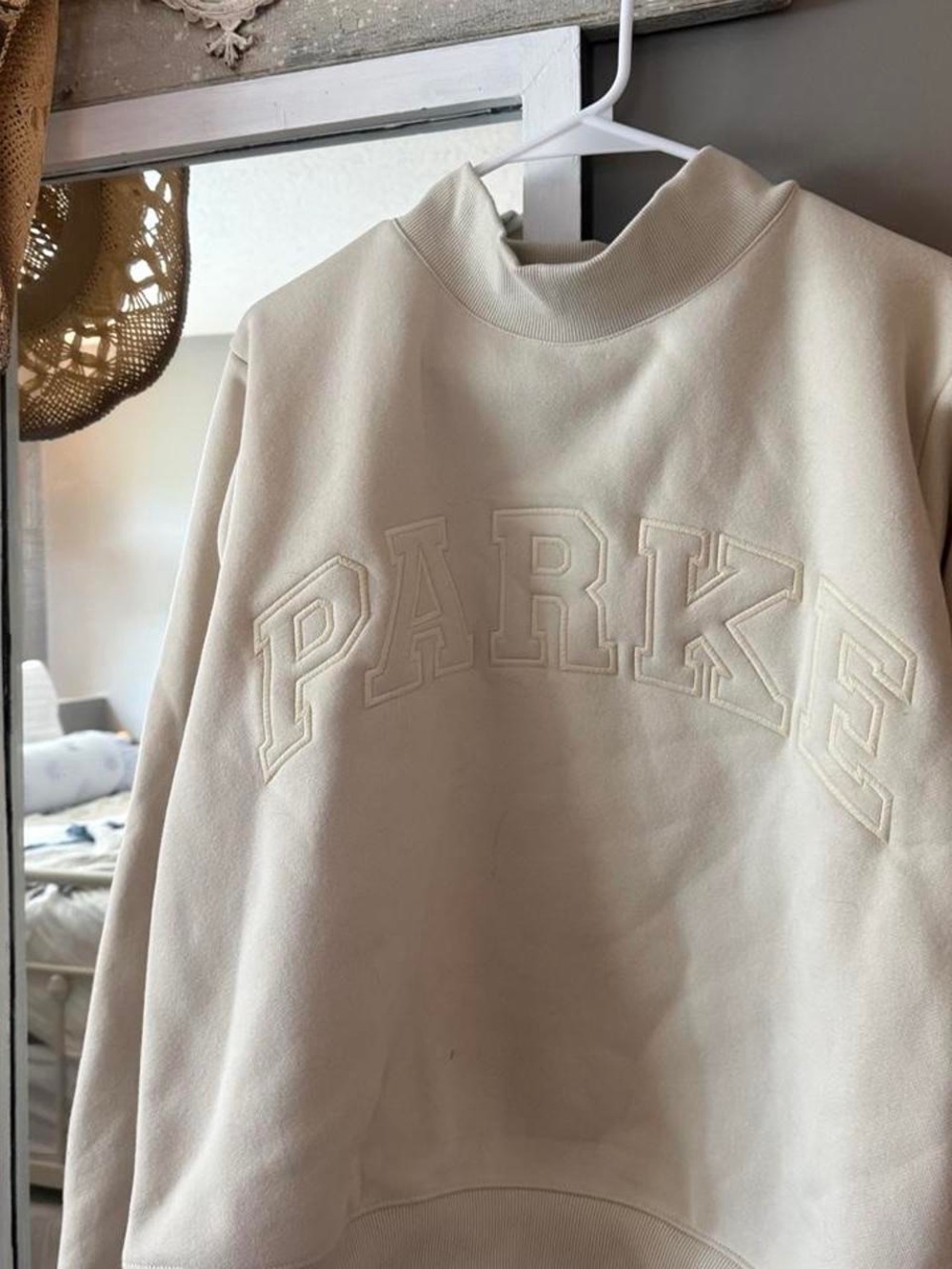 Cream Mock Neck Sweatshirt with Subtle 'PARKER' Embroidery